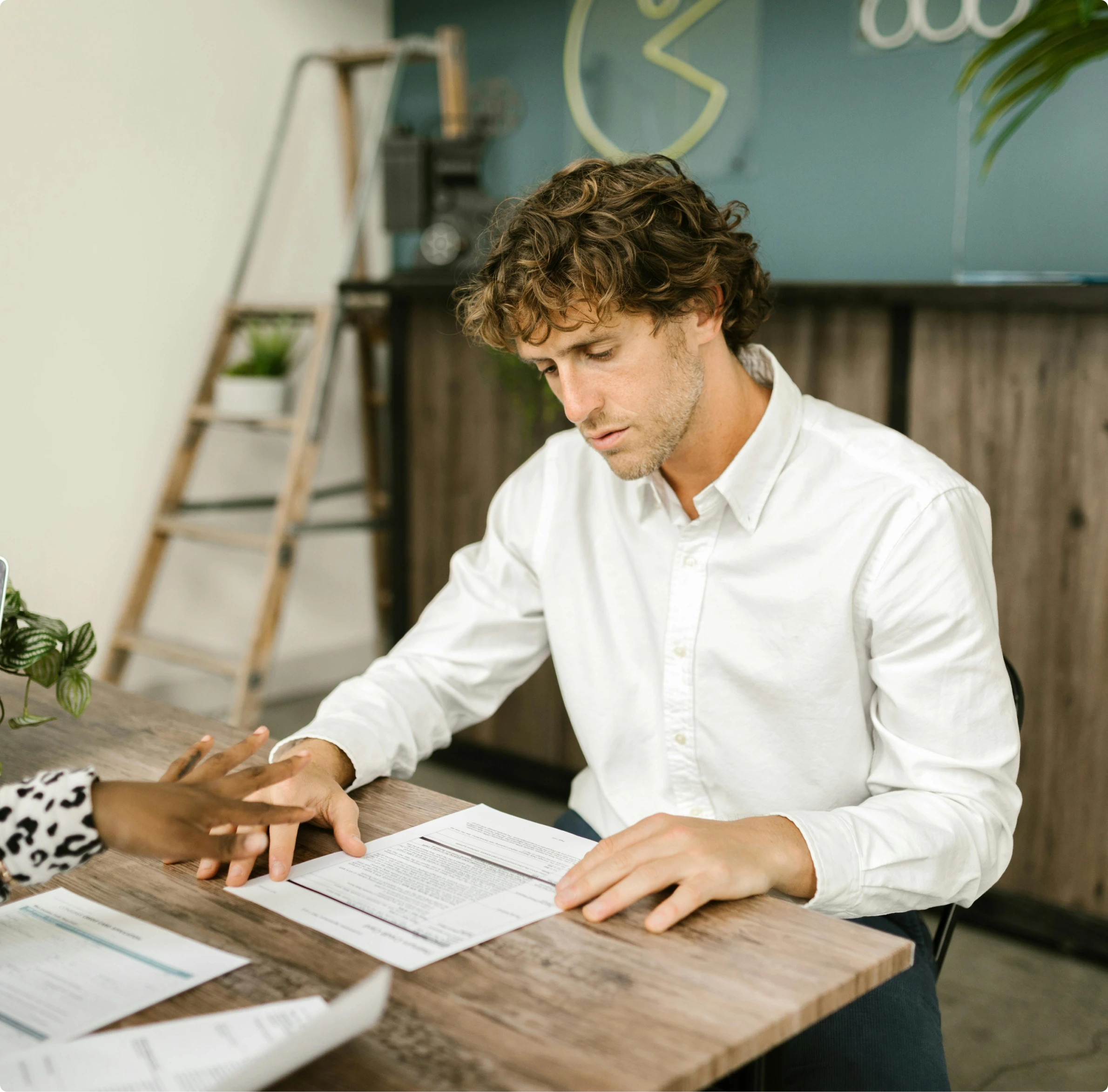 Client reviewing mortgage documents with guidance from Mamba Capital Lending mortgage broker services for home loans and real estate financing.
